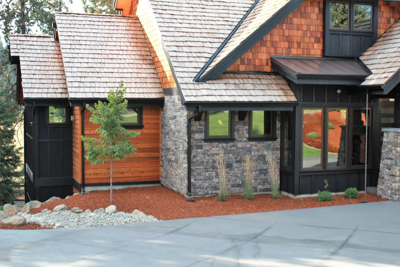 Fresh fines bark blowing on residential property.