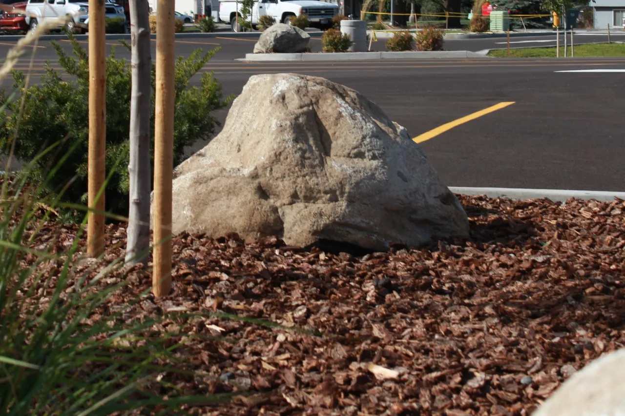 Bark blowing nuggets on a property.